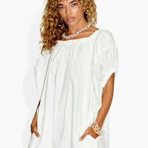 The Celect Shelter Dress